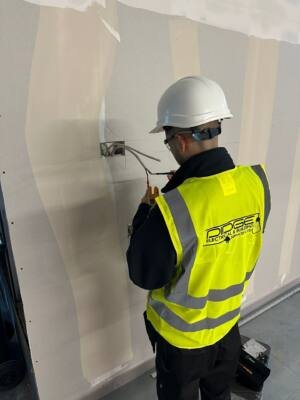 Electrician terminating wiring