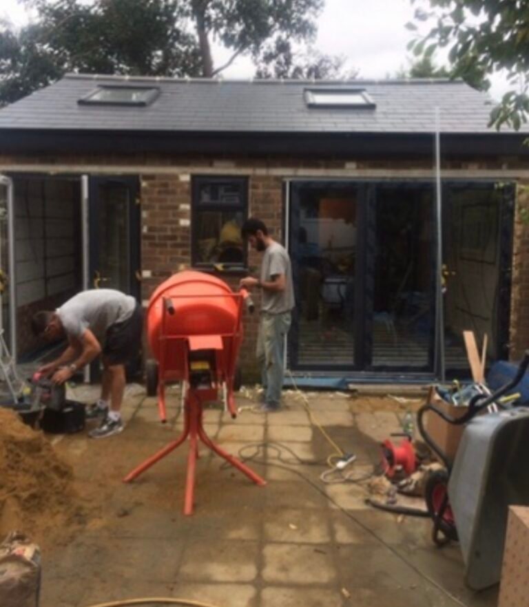 Outbuilding roof tiled with Velux windows