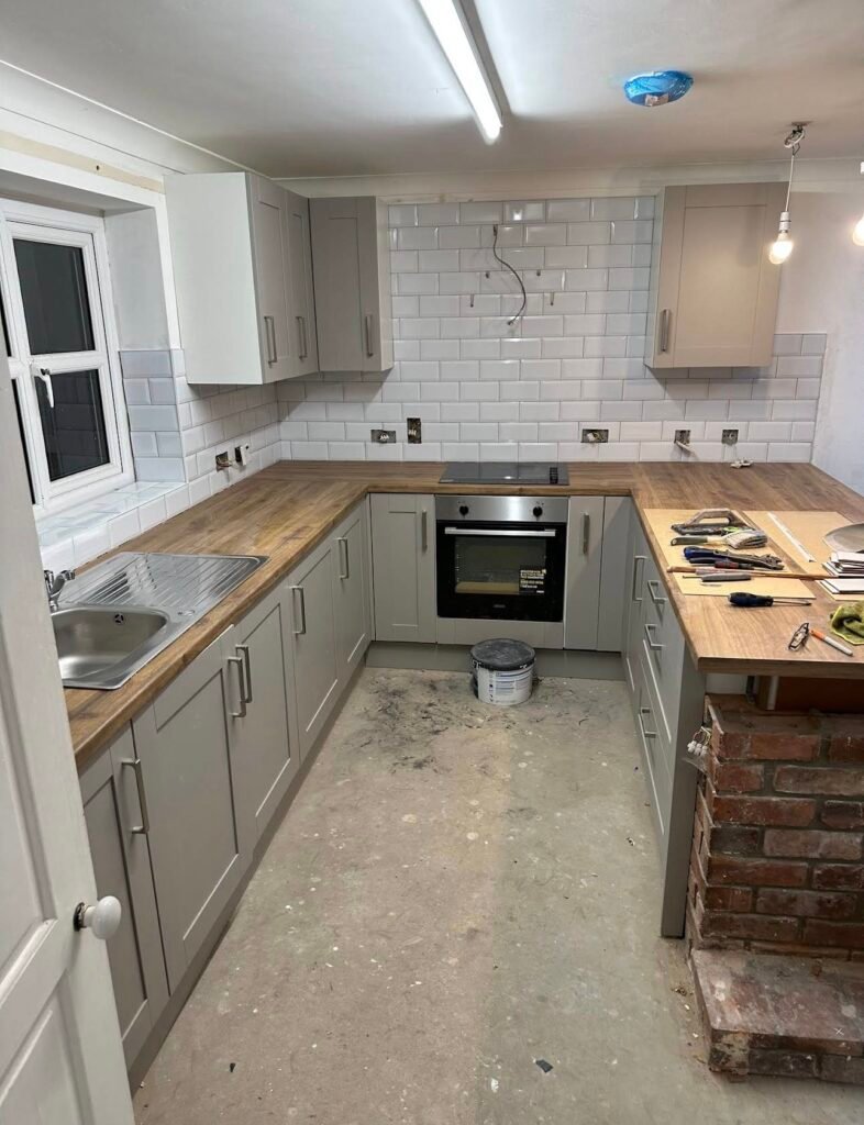 Cottage style kitchen installed, tiled wall upstand