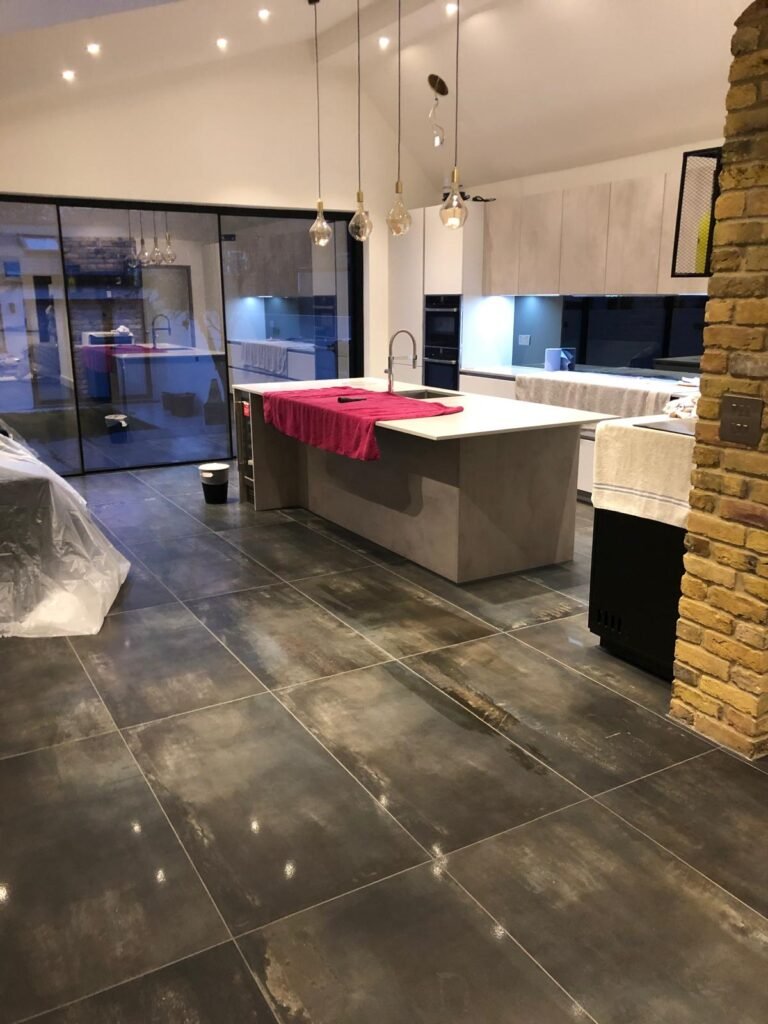 Floor tiled, kitchen installed